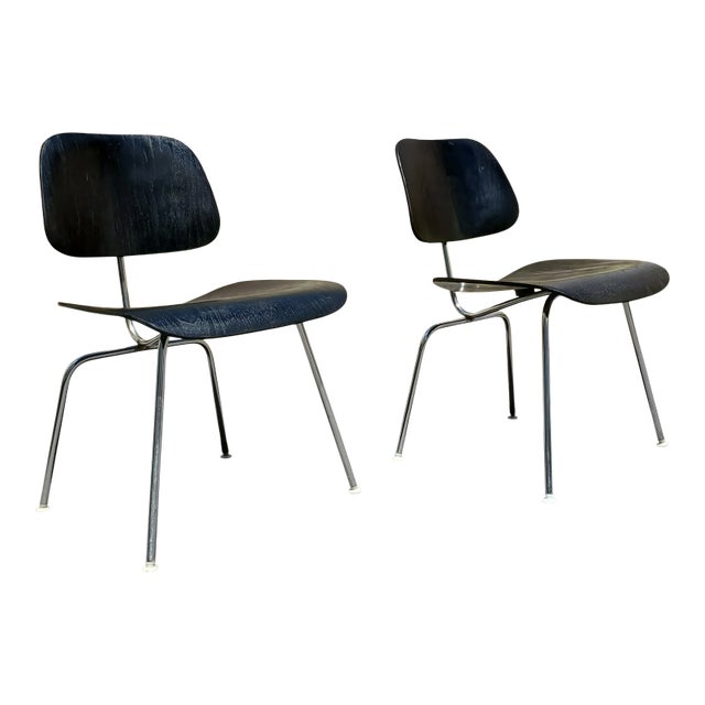 A Black Mid-Century Modern Eames Dcm Chairs For Sale