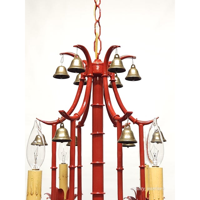 Offered for your consideration is a Fabulous Italian Tole Vintage Red Faux Bamboo Pagoda with Brass Bells Chandelier. The...