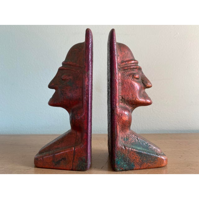 A truly amazing pair of midcentury, solid cast copper bookends featuring Mayan-inspired head design. Deceivingly heavy for...