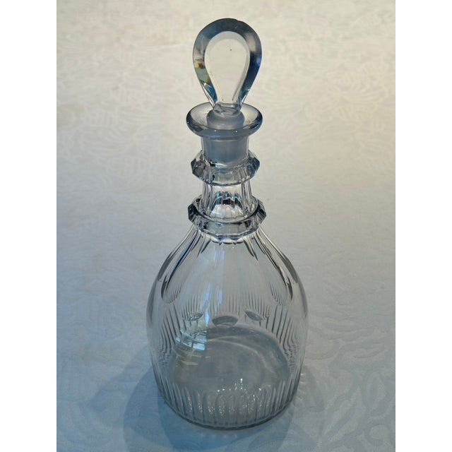 This exceptional Late Georgian period (circa 1790–1820) Anglo-Irish cut crystal decanter is a stellar example of early...