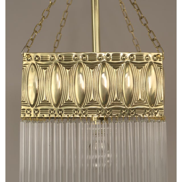 Chandelier made of massive brass. The light provides a pleasant, glare-free light. Polished surface. Up to 250V (Europe/UK...