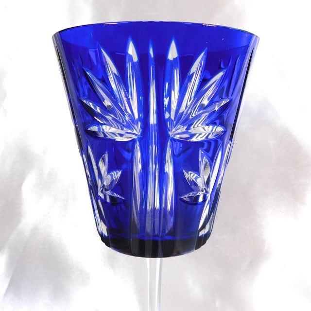 This is a set of two AJKA blue cut to clear crystal stemware glasses. I cannot find the patterrn name and I am not sure...