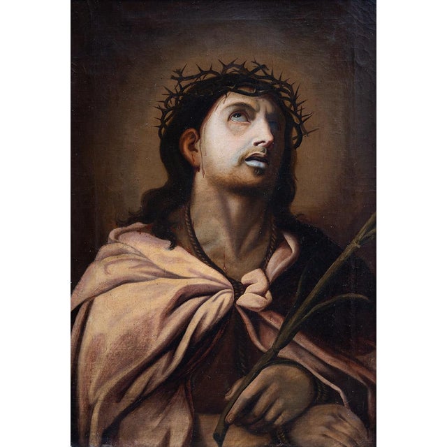 An antique oil painting on canvas with a period frame depicting Ecce Homo, dating from the early 19th century. Christ is...