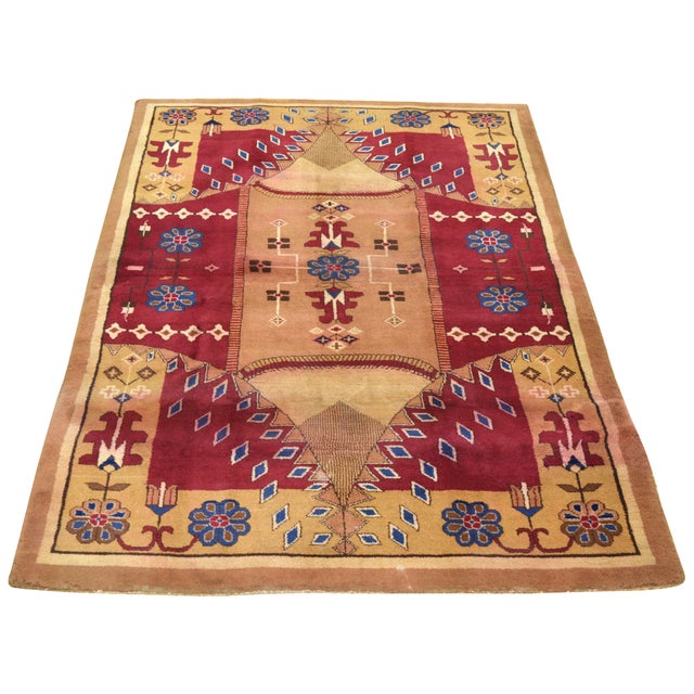 Hand-knotted with care using traditional rug-making techniques, this wool rug blends timeless craftsmanship with a modern...