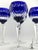 This elegant set of four cobalt blue cut-to-clear wine hocks was produced by Ajka Crystal, Hungary, marked Design Guild....