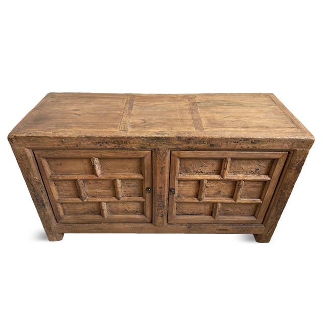 Antique Mongolian thick sturdy elm wood sideboard. Carved brick patterning on two doors and on sides. Original natural...