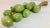 Italian Ceramic Glazed Green Limes on Straw For Sale - Image 4 of 12