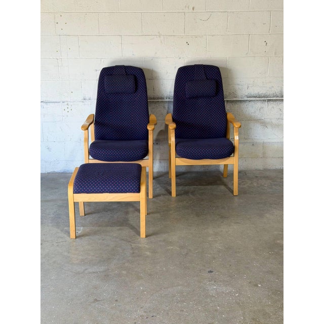 This high-back seating set includes two armchairs and a matching footstool. Built with bentwood frames and integrated...