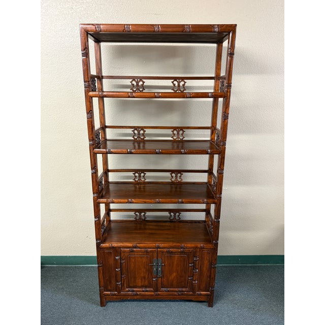 Design Plus Gallery presents a Shelving System with Double-Door Storage and a Unique Chinese Design. This unit has a...