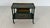 Wooden tea trolley from the 1930s. Classic design with turn-of-the-century decor and a drawer. The tea trolley is in...