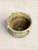 A striking late 19th-century Greek terracotta olive jar, dating to circa 1890, featuring beautifully preserved hand-...
