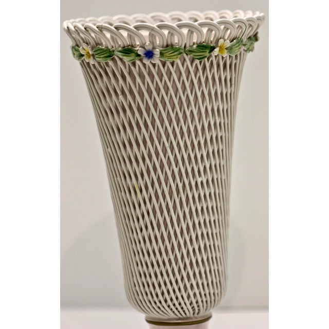 A very beautiful Capo Di Monte Vase. Finely crafted in porcelain and covered with Porcelain filigree and accented with...