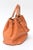 This fabulous top handled vintage original MCM Company orange pebbled leather and gold plated embellished hand bag has 2...