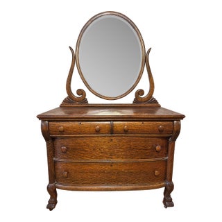 Vintage Tiger Oak Victorian Dresser With Beveled Mirror & Clawfeet. For Sale