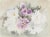 Eve Nethercott's delicate rendering of purple and white flowers is a classic example of the arist's mastery of watercolor....