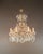 Elegant Antique Crystal Candelabra Chandelier - A Marvel of Art Nouveau Craftsmanship Introducing a truly exceptional...