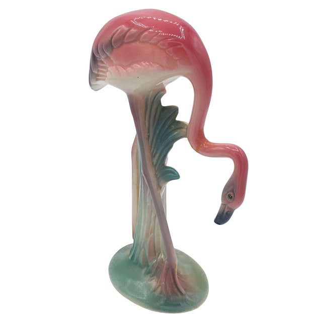 Mid-century pink and green matching California ceramic flamingo tabletop statues by Brad Keeler. The set features two...