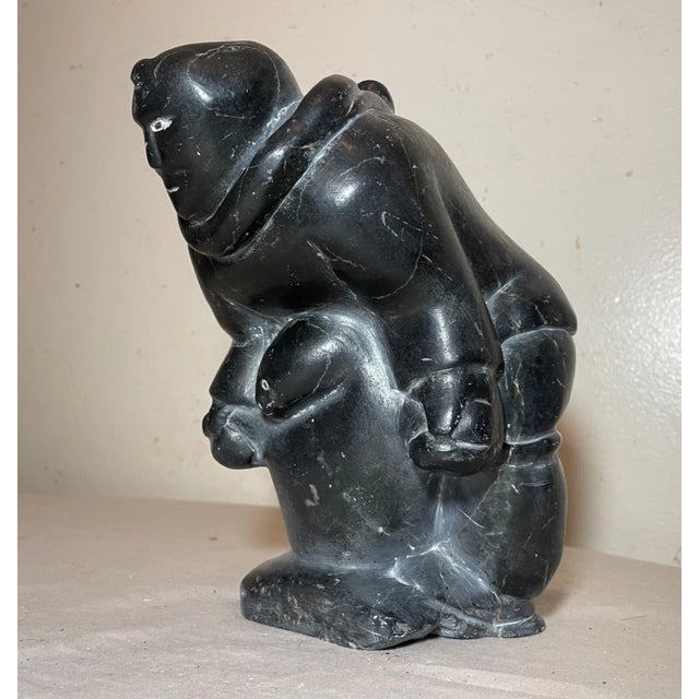 Up for sale is a high quality hand carved antique Canadian Inuit soapstone Eskimo sculpture by Annie. It's sculpted out of...