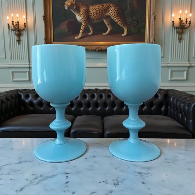 An elegant pair of vintage French opaline glass goblets by Portieux Vallerysthal, celebrated for its refined color work...