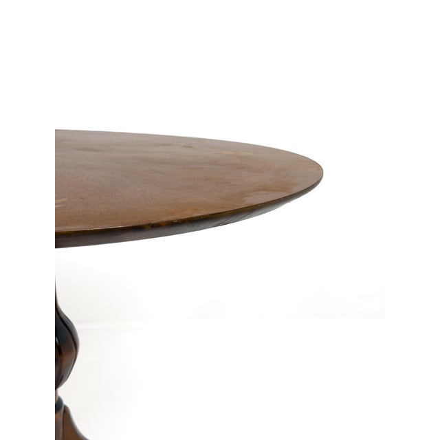 An elegant Swedish Grace center table produced in Sweden during the 1930s, featuring a beautifully proportioned circular...