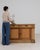 Here is a sideboard, its natural bleached oak, 2 doors open showing shelf the first thing to catch the eye. The piece...