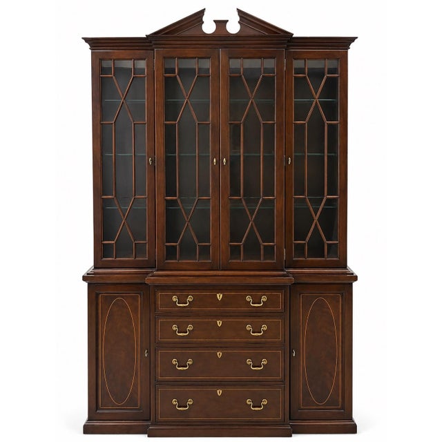 This is a Hickory White Georgian or federal style inlaid mahogany satinwood display cabinet. It is part of the...
