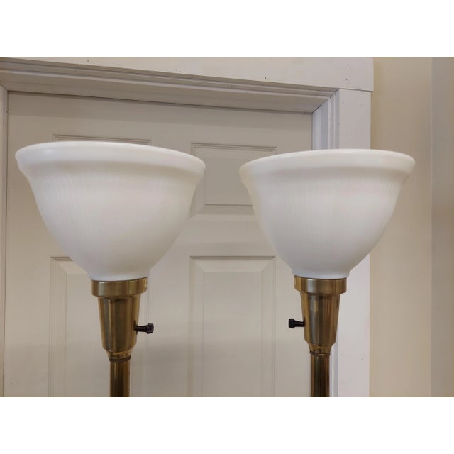 They are both have the stiffel company sticker. They are both in near fine condition and they work great. measures roughly...