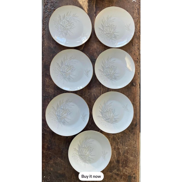 Lovely set of 7 mid century fine China dinner plates in a crisp white with pale gray and light yellow grassy leaves,...