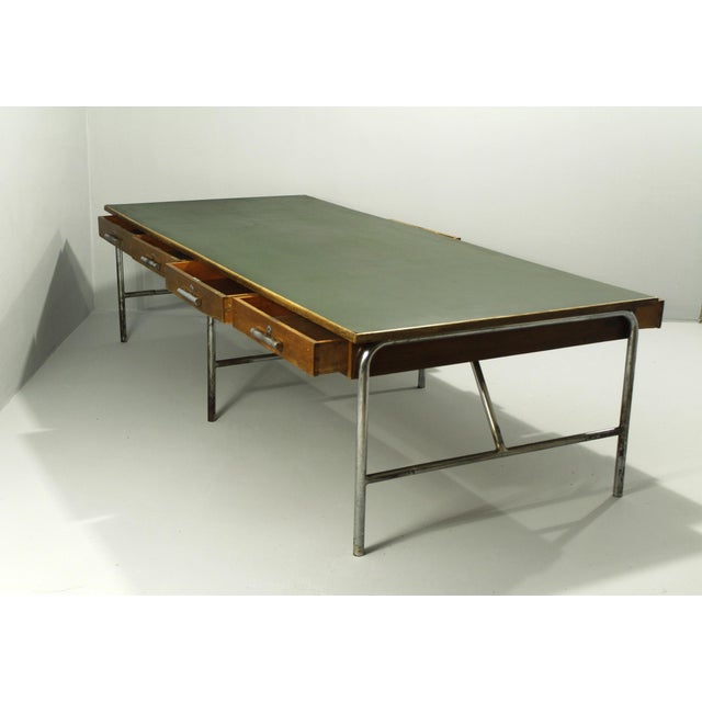 A unique four-person writing desk from the 1930s; the desk is in its original condition without any modifications or...