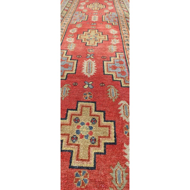 Early 20th Century Antique Khotan Runner From Turkestan With Geometric Medallions in Red Background For Sale - Image 5 of 8