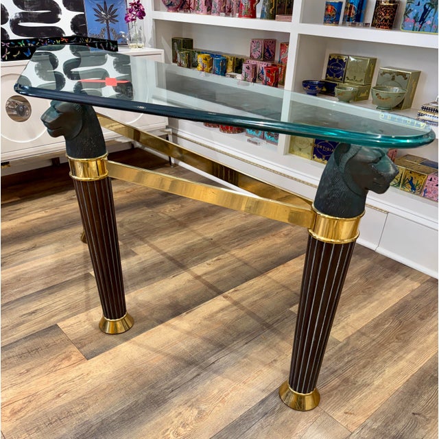 What a statement piece! This Art Deco Style glass top triangle table is epitome of Italian style with its trio of bronze...