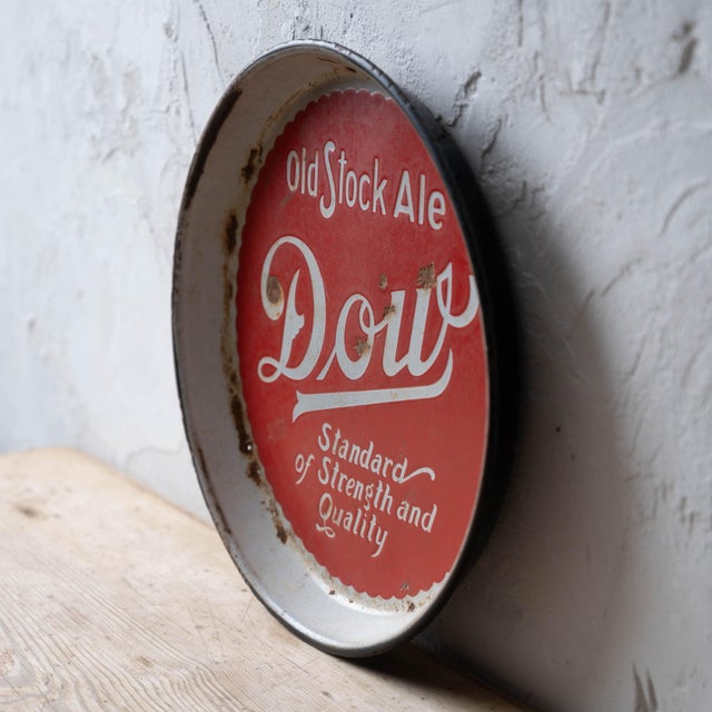 Vintage porcelain beer tray for "Dow Old Stock Ale" from Dow Brewery, Montreal, with bold red "Dow" logo and "Old Stock...