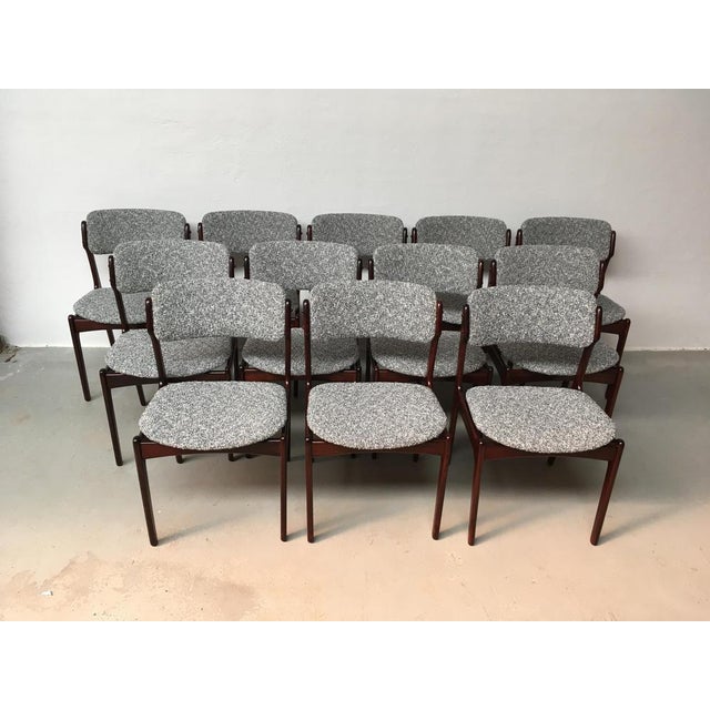 Twelve Erik Buch restored rosewood dining chairs in excellent condition manufactured by Oddense Maskinsnedkeri in the...