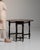 This piece presents as a drop-leaf gateleg table, distinguished by dark walnut, oval top, turned legs. It was made in...