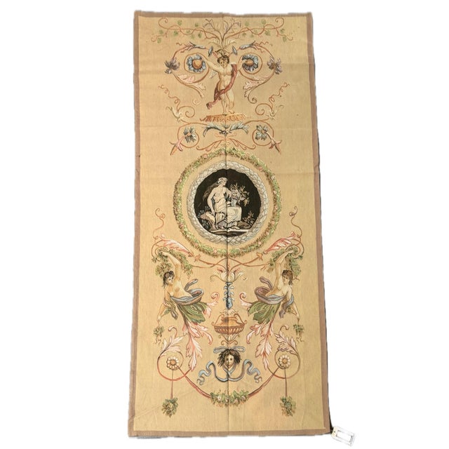 This distinctive vintage tapestry features an elaborate Neoclassical-inspired composition of mythological figures,...