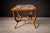 This sculptural side table reflects the organic formal language that defined Brazilian modernism in the mid-20th century....