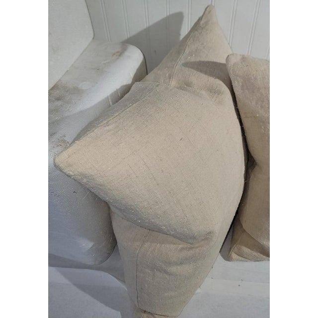 These 19thc homespun linen pillows are in fine condition with no stains or damages.The inserts are down & feather...