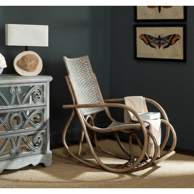Inspired by the timeless Bauhaus aesthetic of the design classic created by Michael Thonet, this modern wicker rocking...