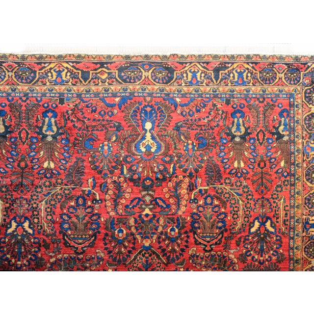 A wonderful early 20th century Persian Kashan rug with large-scale all-over mirrored floral pattern woven in indigo,...
