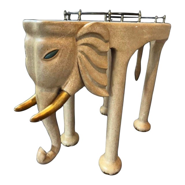 This Late 20th Century Marge Carson Elephant Bar Cart is a spectacular and rare creation that is both functional and...