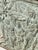 Substantial antique cast iron fireback featuring an elaborate raised figural scene surrounded by a molded border. The...