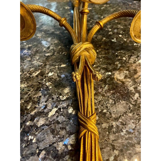 Pair of Louis XVI style gilt bronze sconces from the first half of the 20th century. This model of sconces of great class...