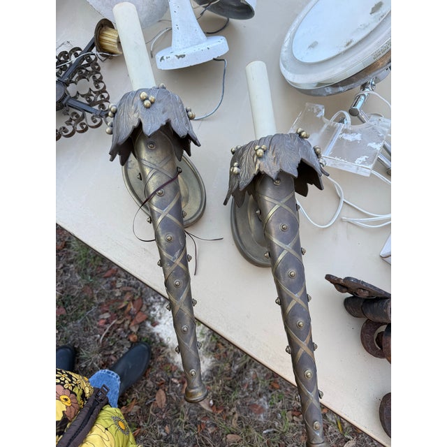 Bronze/Brass torchère wall sconces. Created by Chapman Manufacturing, circa 1990s.
