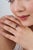 This vintage-style engagement ring features a 1.01-carat deep-blue oval-cut blue sapphire, set in 14k yellow gold. The...