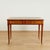 Refined 18th century English writing desk handcrafted in mahogany, rosewood and burled walnut with geometric inlays,...