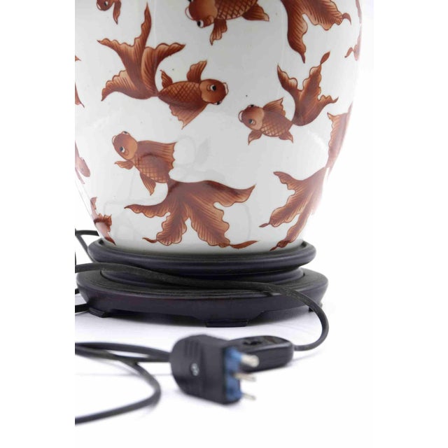 Red fishes lamps is an original decorative objects realized in Italy in the half of 20th century. A beautiful couple of...