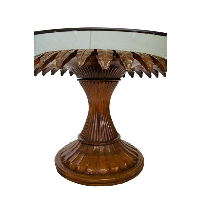Daisy Table in Carved Walnut with Glass Top Italy, circa 1960 An exceptional Italian centerpiece table with a striking...