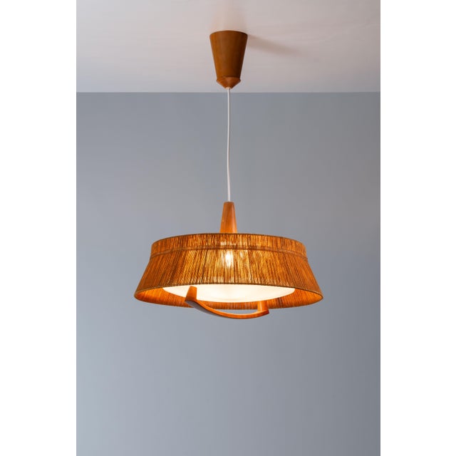 Large pendant light by German manufacturer Temde Leuchten. In very good condition. This piece is attributed to the...