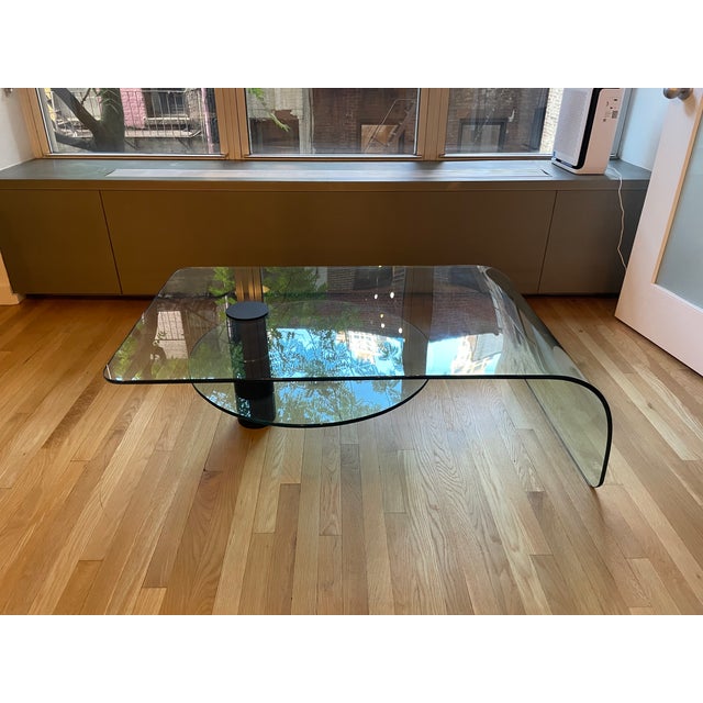 A very unusual example of post modern mastery. This coffee table is in excellent condition with just a couple of very...