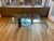 A very unusual example of post modern mastery. This coffee table is in excellent condition with just a couple of very...
